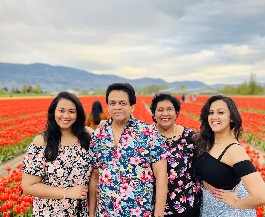 Dr. Osara Malalasekara with family in tulip fields